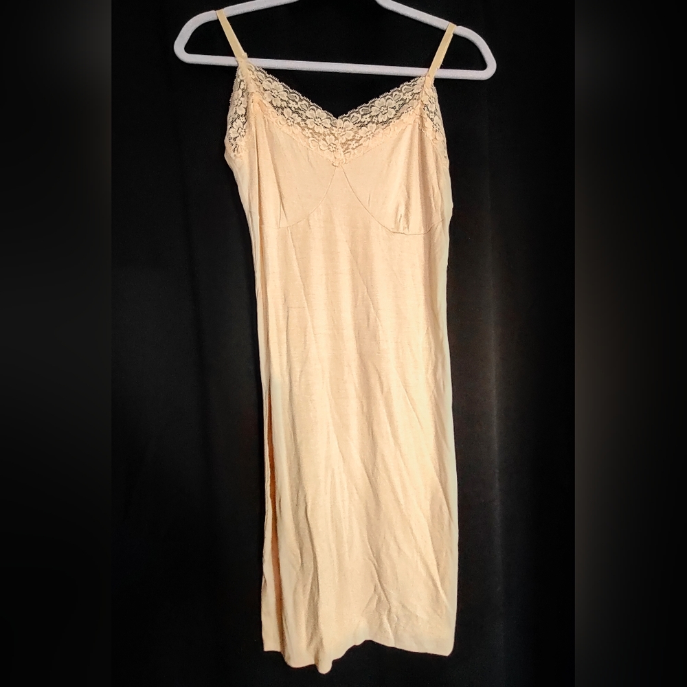 never worn lace dress slip or night gown, very light weight